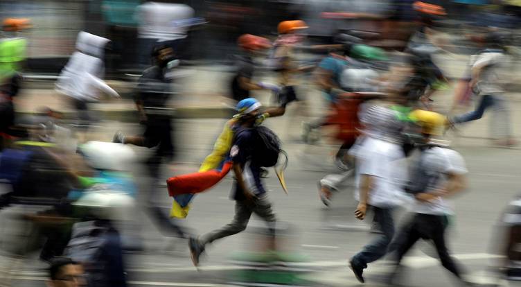Krisen i Venezuela fortsetter. Og det er daglige demonstrasjoner og sammenstød sikkerhetsstyrkene i landet. Foto: Carlos Barria/Reuters/NTB scanpix